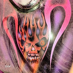 Tribal skull done 10 years ago by Elite Paintworx By Moore